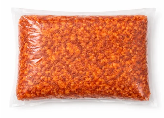 Bulk ground beef in clear plastic vacuum-sealed bag, ideal for wholesale food distribution and foodservice suppliers.